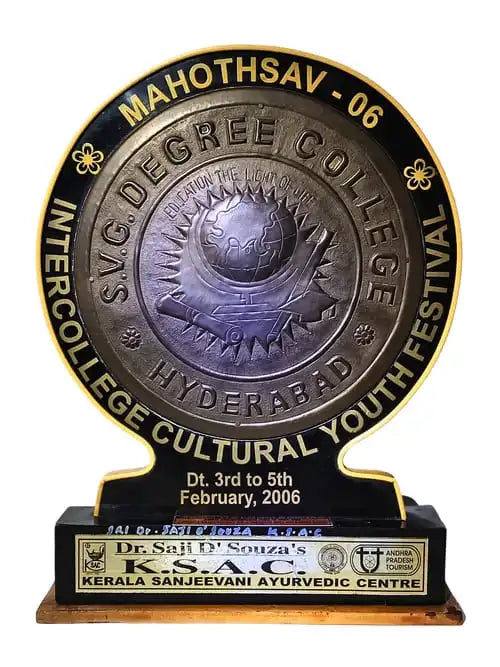 Decorative plaque with text and a central emblem, likely an award or recognition item.